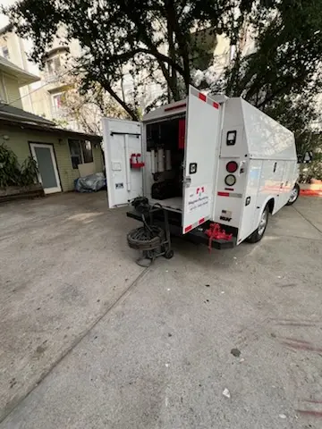 Magnet Plumbing service vehicle on-site for Water Heater Repair in Bahama